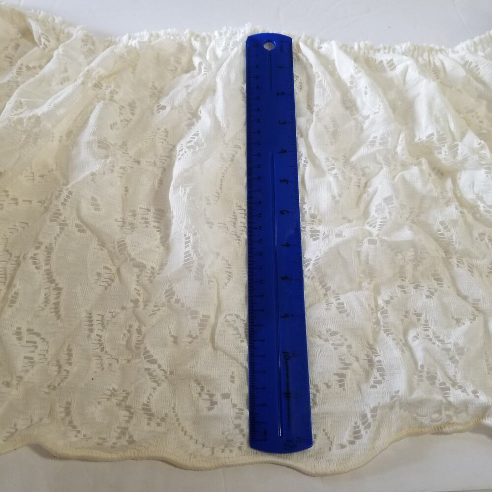 Seven and one half yards vintage cream lace twelve inches wi